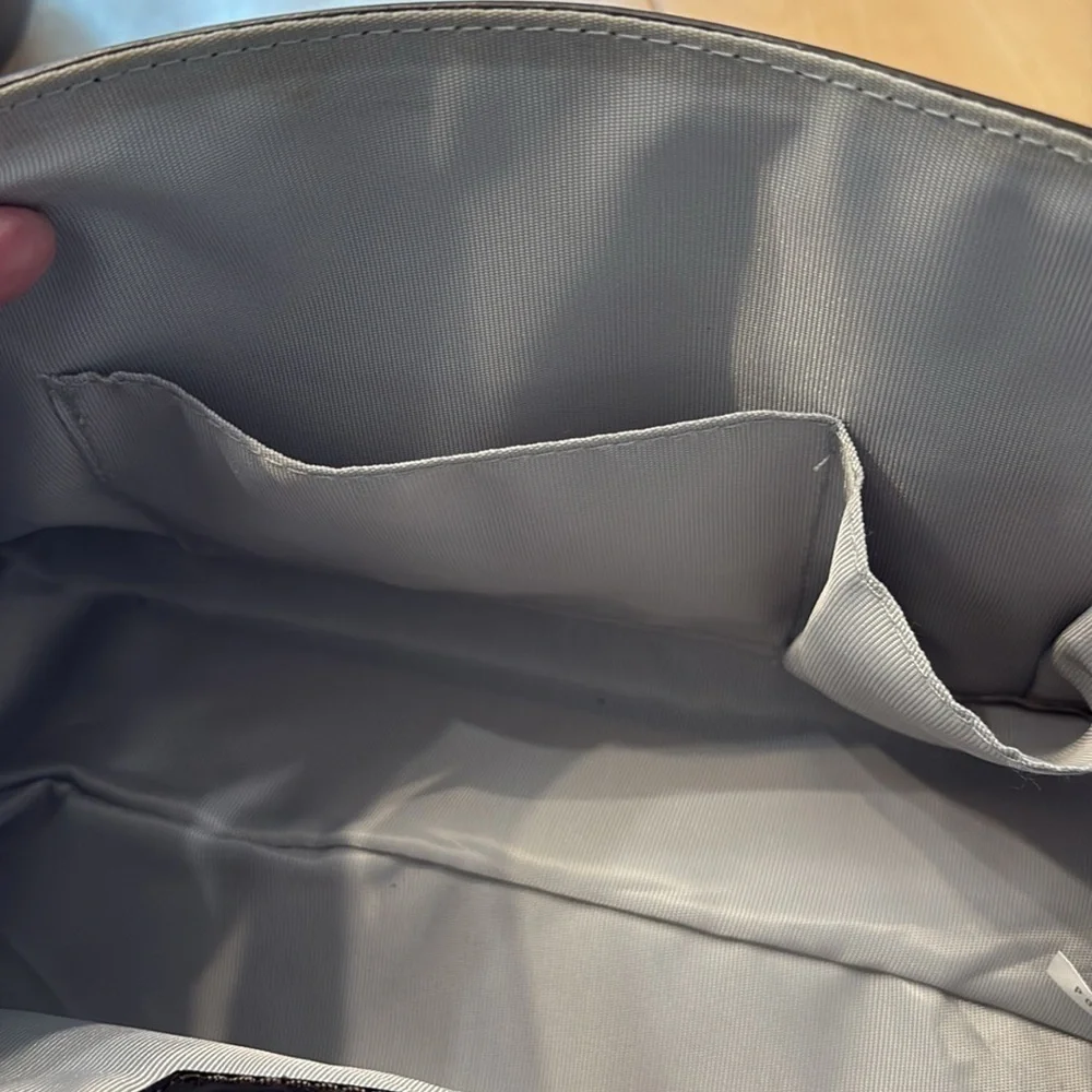 Beijo dark brown patent leather shoulder bag with magnetic close.